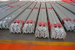 Metalworking Prints: A batch of neatly arranged galvanized angle steel