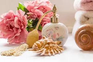 Towels Prints: Bath arrangement with perfume bottle and pretty flowers