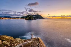 Nightfall Prints: The bay of San Sebastian in Spain with Monte Igueldo at sunset