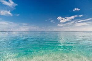 Images Dated 14th December 2015: Beach and beautiful tropical sea. Caribbean or Maldives summer sea with blue water