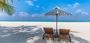 Images Dated 21st January 2022: Two beach beds for couple beach travel. Summer nature landscape, tropical island shore, sea view
