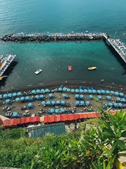 Bay Shore Prints: A beach with many umbrellas and boats