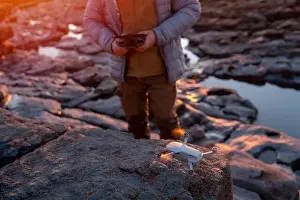 Remote Control Prints: Bearded man using a drone with remote controller making photos and videos