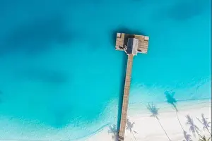 Careless Prints: Beautiful aerial view of poolside and resort beach with wooden pier jetty