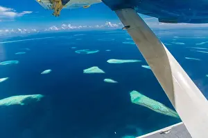 Beautiful aerial view of resort water bungalows in Maldives