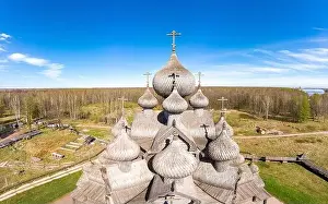 Trinity Prints: Beautiful Aerial view to traditional Russian village with orthodox wooden chapel and bell tower in Bogoslovka manor