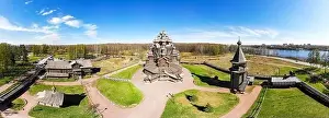Beautiful Aerial view to traditional Russian village with orthodox wooden chapel and bell tower in Bogoslovka manor