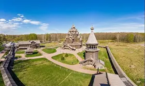 Trinity Prints: Beautiful Aerial view to traditional Russian village with orthodox wooden chapel and bell tower in Bogoslovka manor