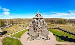 Trinity Prints: Beautiful Aerial view to traditional Russian village with orthodox wooden chapel and bell tower in Bogoslovka manor
