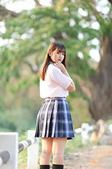 Skirt Prints: beautiful asian japanese school girl uniform looking at park outdoor