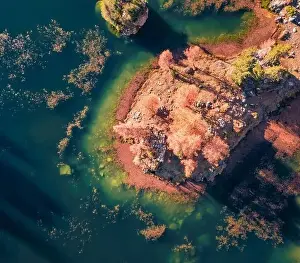 Dreamland Prints: Beautiful autumn scenery. Straight down view of red larch trees on the islet on Federa lake