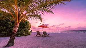 Beautiful beach. Chairs on the sandy beach near the sea. Summer holiday and vacation concept for tourism. Inspirational tropical landscape