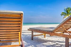Images Dated 22nd January 2022: Beautiful beach. Couple chairs on the sandy beach near the sea