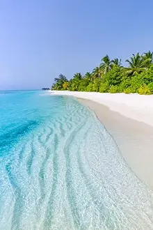 Beautiful beach and tropical sea. Wonderful beach nature, Maldives scenery, perfect view of exotic landscape, white sand and blue sky. Luxury resort