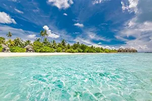 Beautiful beach and tropical sea. Wonderful beach nature, Maldives scenery, perfect view of exotic landscape, white sand and blue sky. Luxury resort