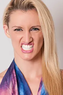 Grinding Prints: Beautiful blond woman grinding teeth