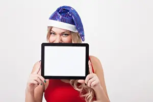 Touchpad Prints: The beautiful blonde with big breasts standing on a white backgr