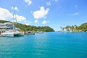 Holiday Destination Prints: Beautiful blue sea water at Rodney Bay Marina with white catamarans