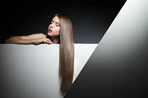 Long Haired Prints: Beautiful brunette with long hair and eyes closed
