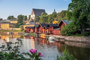 Beautiful city landscape with idyllic river and old buildings at summer evening in Porvoo, Finland