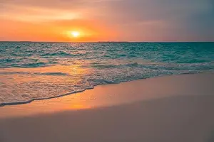 Beautiful cloudscape seascape, sunrise sunset view. Calm sea waves splashing on soft sand, relaxing nature beach, tranquil summer landscape, inspire