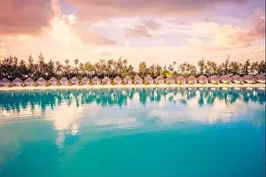 Sunset Beach Prints: Beautiful colorful sunset at tropical island on Maldives in Indian Ocean