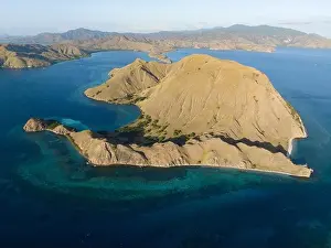 Scrub Prints: Beautiful coral reefs and idyllic beaches are found on Gili Darat in Komodo National Park