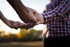 Flirting Prints: Beautiful Couple on a Farm Holding Hands