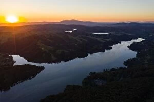 Aerial Landscape Collection: A beautiful dawn breaks over the green hills around the San Pablo Reservoir in Northern California