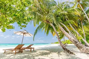 Chaise Prints: Beautiful exotic beach. Chairs on the sandy beach near the sea