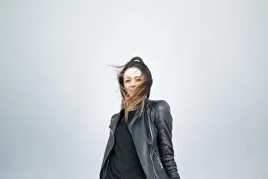 Windy Prints: Beautiful girl in a plain background
