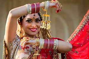 Beautiful Woman Prints: Beautiful Indian bride in traditional wedding dress and posing