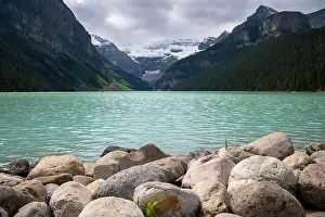 Mountain Peak Prints: Beautiful Lake Louise on a cloudy day, Banff National Park, Alberta, Canada