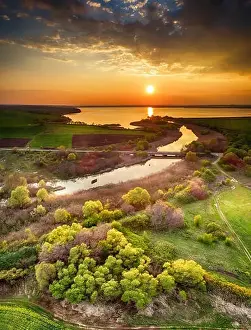 Lake Forest Prints: Beautiful landscape with fiery sunset over the lake and river near Burgas
