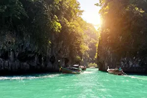Beautiful landscape of rocks mountain and crystal clear sea with longtail boat at Phuket, Thailand. Summer, Travel, Vacation, Holiday concept