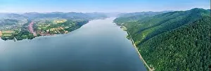 Green Lake Prints: Beautiful landscape of a scenic town along the Danube River with green forests and blue waters