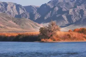 Flows Prints: Beautiful large river Ili in Kazakhstan with blue transparent water