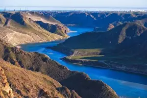 Flows Prints: Beautiful large river Ili in Kazakhstan with blue transparent water
