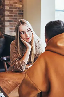 Croissant Prints: Beautiful long hair blonde girl looking at the boyfriend and smiling