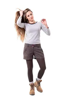 Full Body Prints: Beautiful long hair cute candid woman holding hair walking