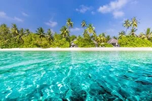 Images Dated 9th January 2017: Beautiful Maldives island beach landscape. Luxury resort with chairs