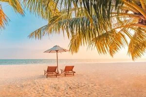 Images Dated 13th December 2018: Beautiful Maldives island, sunset beach landscape. Luxury resort chairs