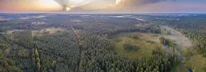 Storm Cloud Prints: Beautiful misty evening panoramic landscape photographed from drone. Magical atmosphere