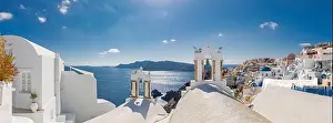 Beautiful Oia town on Santorini island, Greece. Traditional white architecture amazing panoramic landscape. Perfect summer vacation travel destination