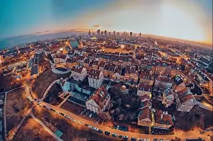European Culture Prints: Beautiful panoramic aerial drone skyline sunset view of the Warsaw City Centre with skyscrapers of the Warsaw City