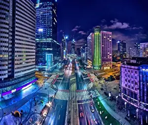 Light Night Prints: Beautiful panoramic aerial drone skyline view of the center of night Warsaw with skyscrapers in the background