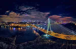 Light Night Prints: Beautiful panoramic aerial drone skyline view of the center of night Warsaw with skyscrapers in the background with