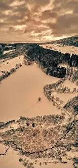 Cedar Prints: Beautiful panoramic aerial drone view on a winter landscape in the Stolowe mountains during a snowfall