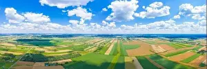 Beautiful panoramic aerial view photo from flying drone to Meadow with dandelions on a sunny day