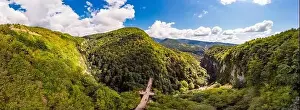 Imereti Prints: Beautiful panoramic view from the drone to Tourists On Observation Platform on Suspension Bridge Up To 140 Meters Above